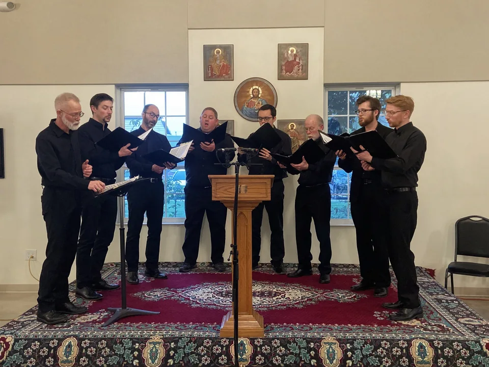 An ensemble singing together from music folders